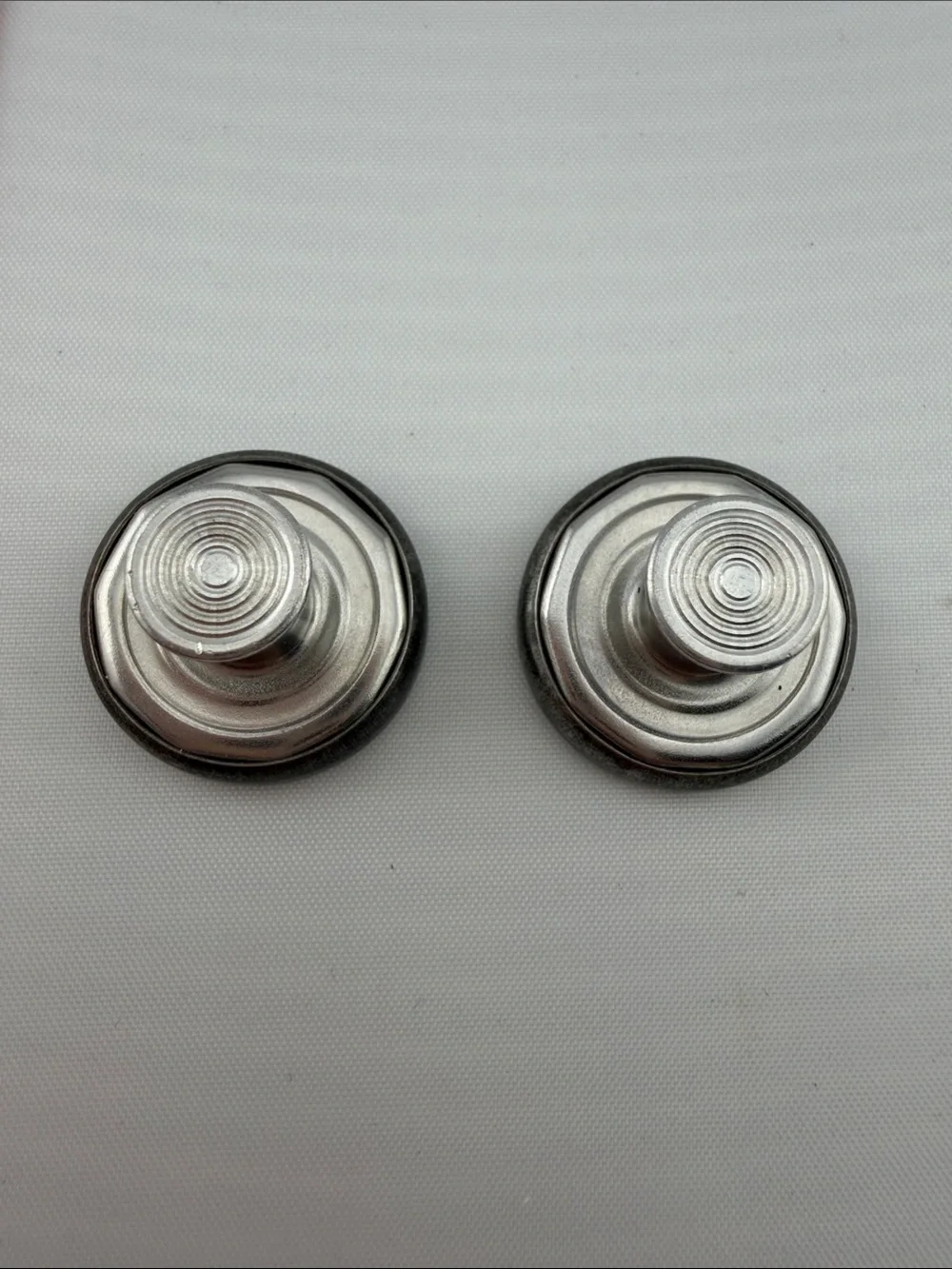 Vintage RSQ Silver-Tone Round Cufflinks with Raised Cross Emblem